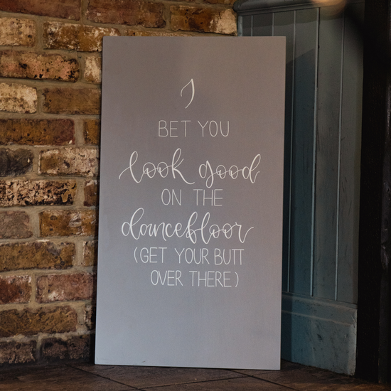 Personalised wooden quote sign for Kent wedding couple, painted in grey with white faux calligraphy